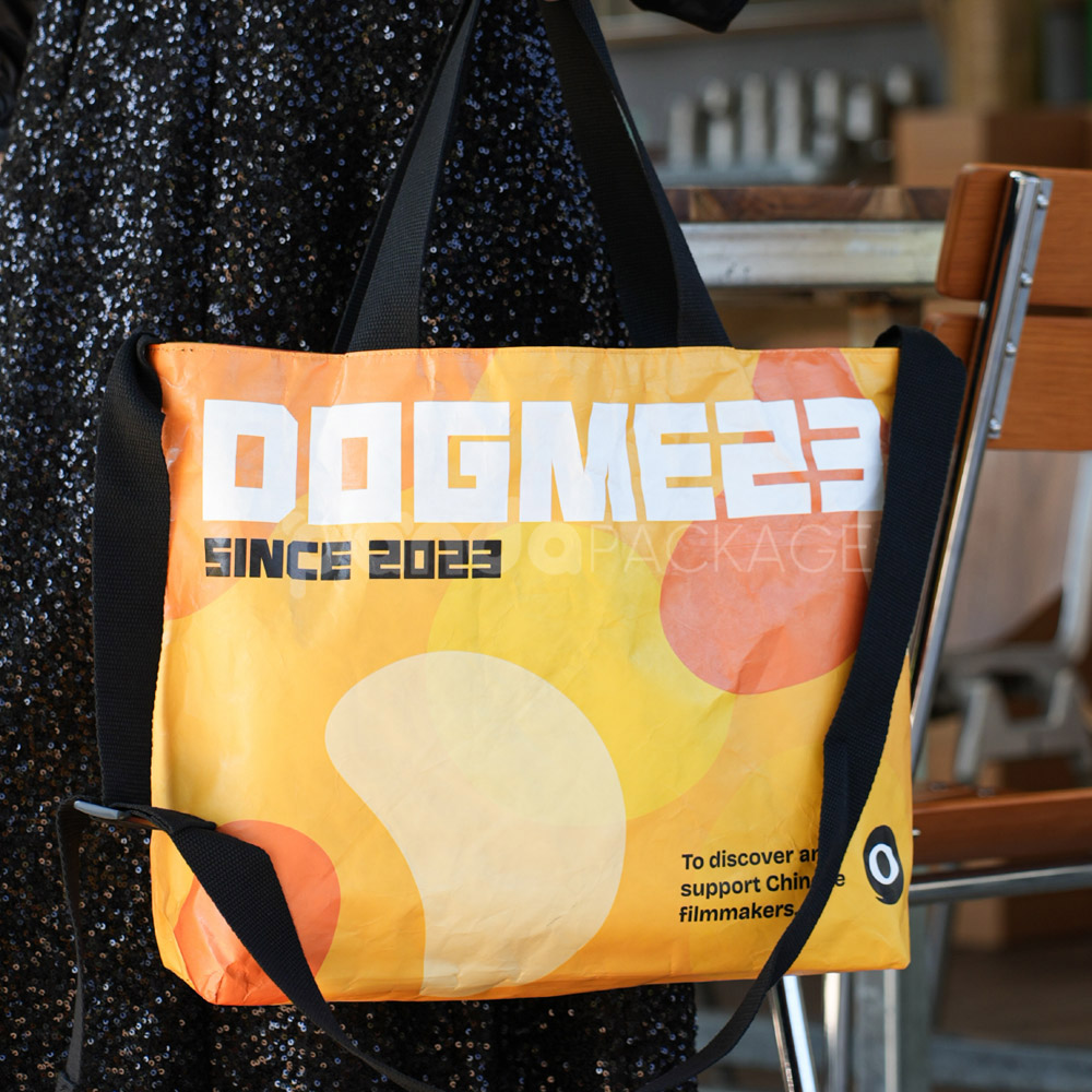 Eco-friendly graphic tote bag with shoulder strap and vibrant print