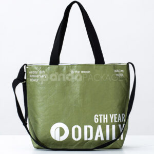 Olive green eco tote bag with black handles and branding