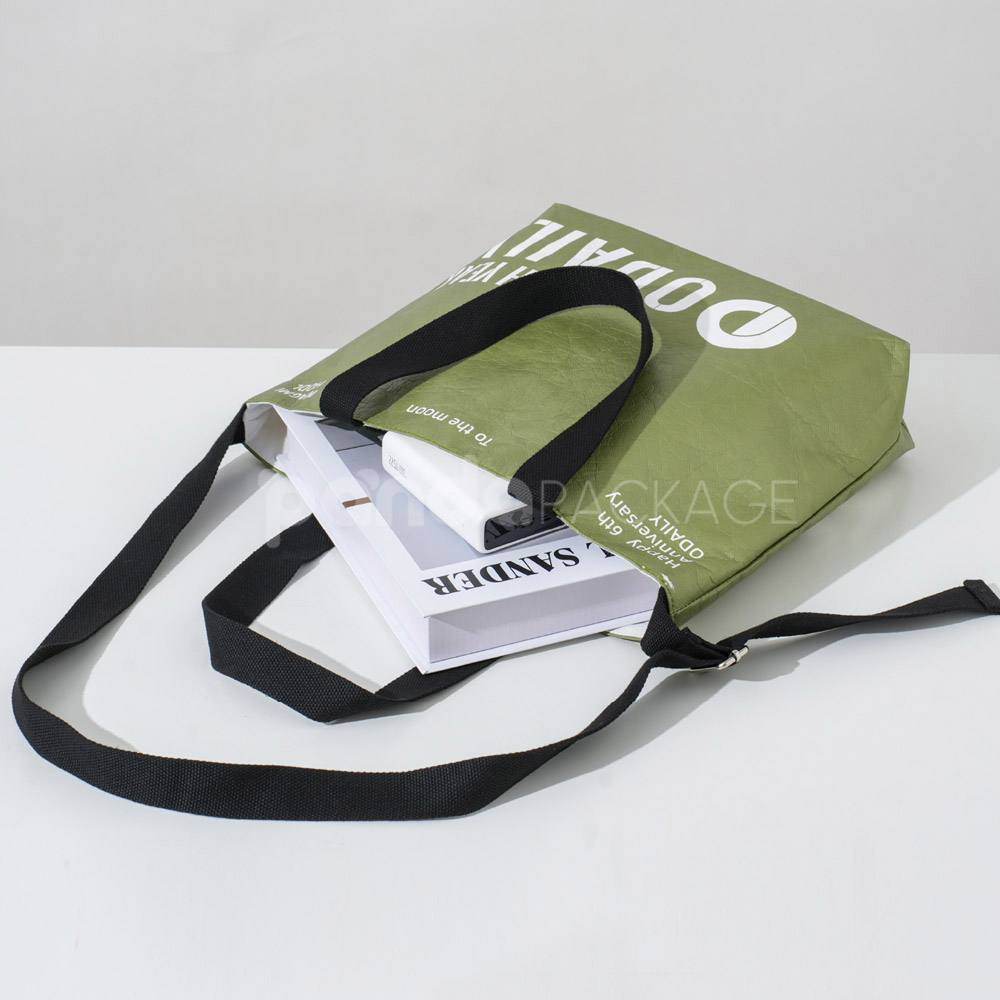 Olive green eco tote bag with black handles and branding