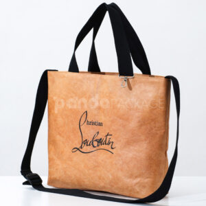 Brown kraft paper tote bag with black handles and shoulder strap