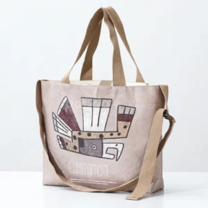 Eco paper tote bag with tribal bird design and shoulder strap