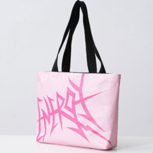 Pink paper tote bag with graffiti-style print and black handles