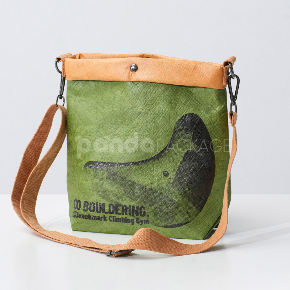 Eco-friendly green paper crossbody bag with brown strap