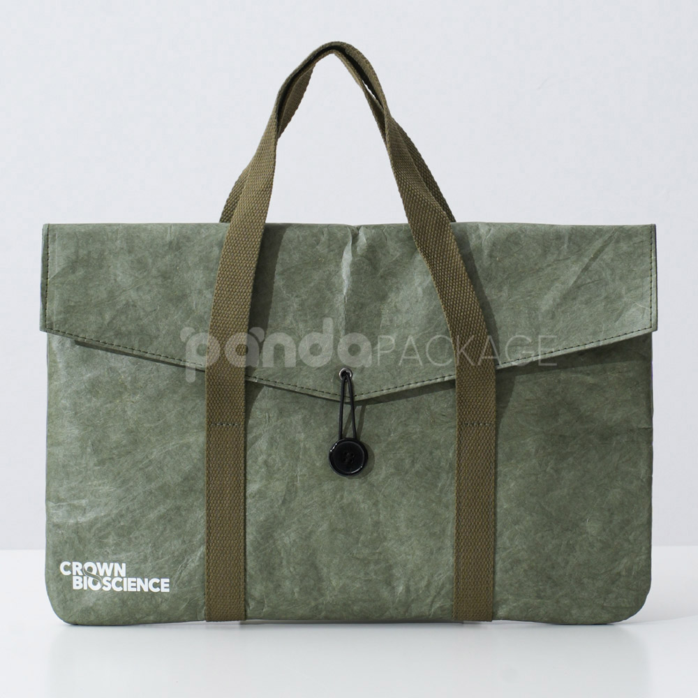 Green kraft paper tote bag with button string closure