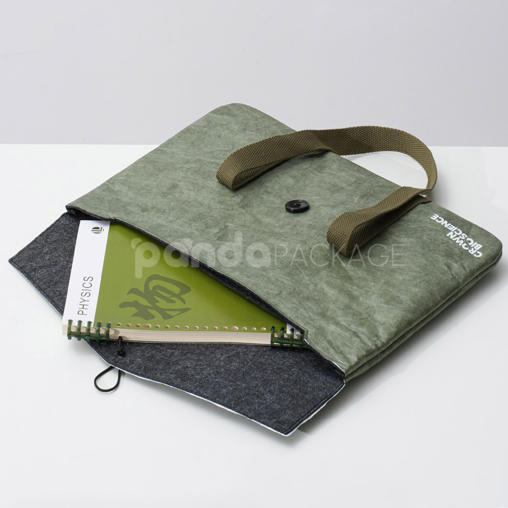 Green kraft paper tote bag with button string closure