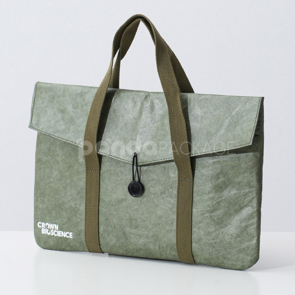 Green kraft paper tote bag with button string closure