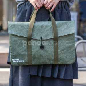 Green kraft paper tote bag with button string closure