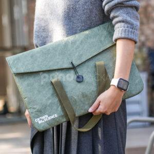 Green kraft paper tote bag with button string closure