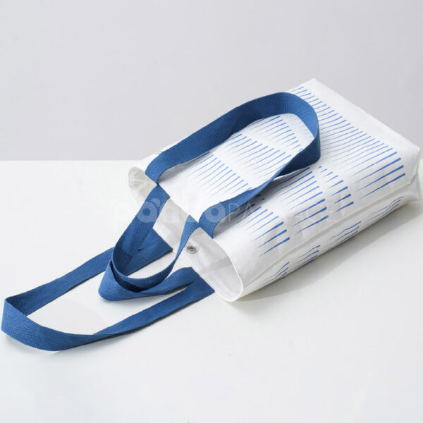 Ivory Tote with Abstract Blue Line Design