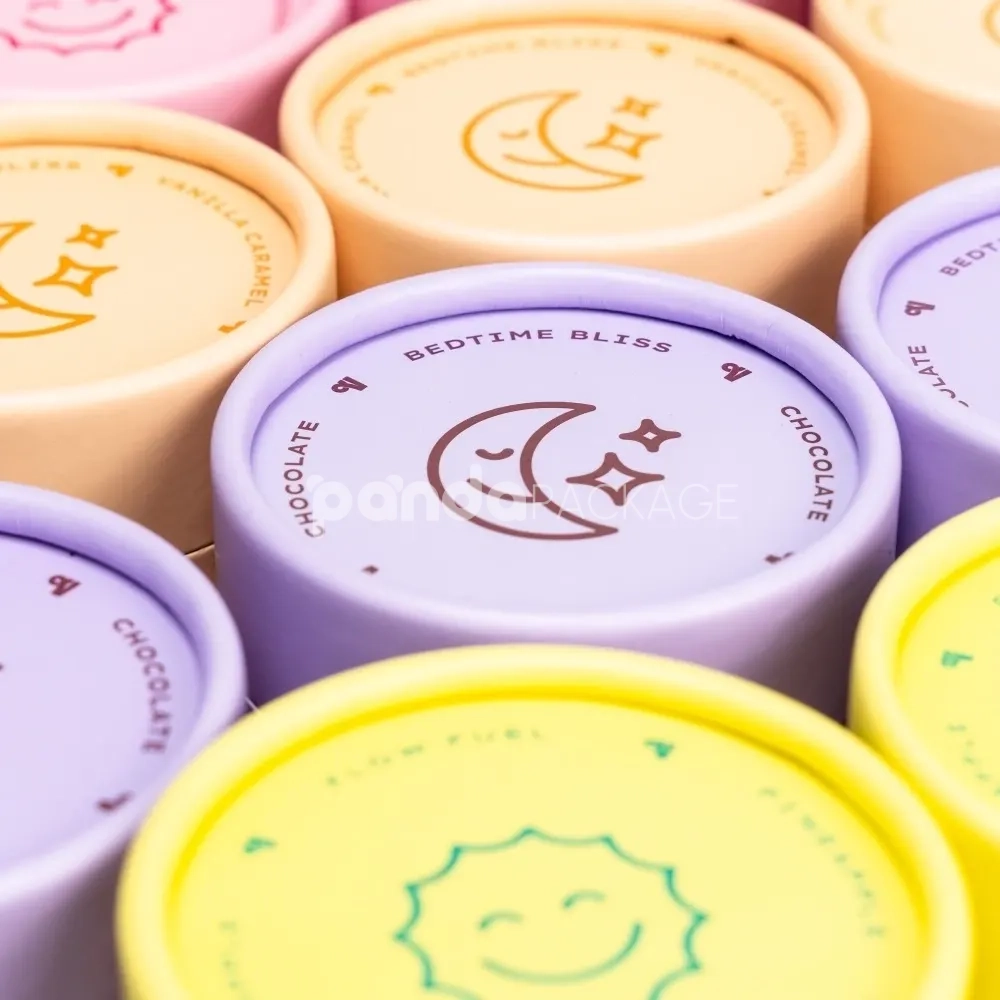 Pastel rigid paper tube with inner plastic lid for powdered product packaging