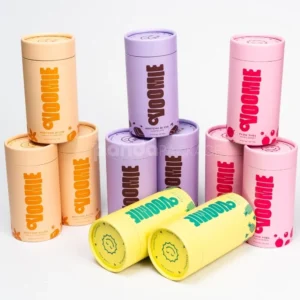 Pastel rigid paper tube with inner plastic lid for powdered product packaging