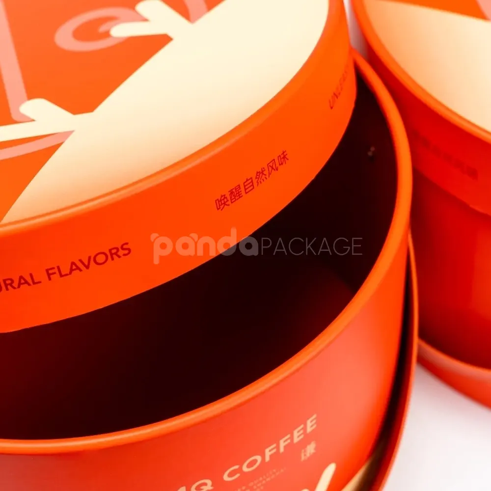 Custom orange round rigid box with lid and handle strap for luxury packaging