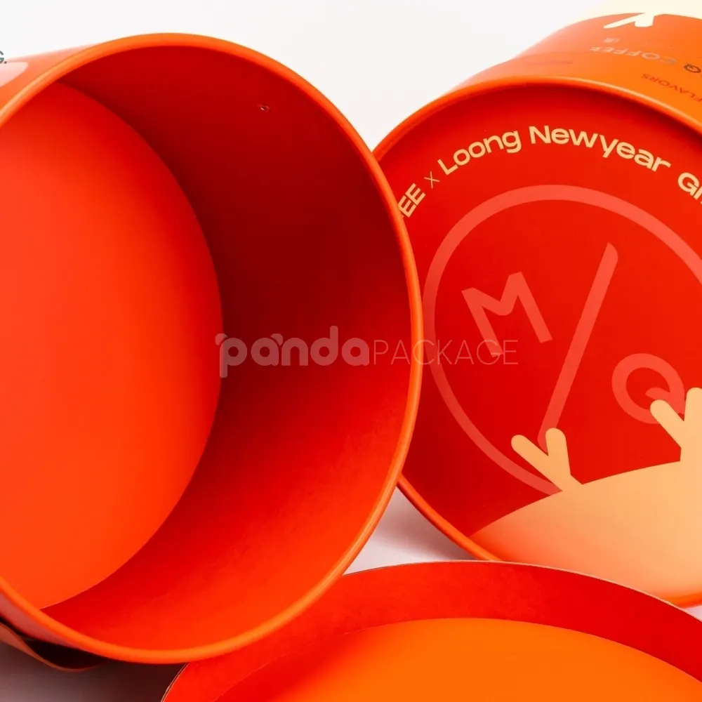 Custom orange round rigid box with lid and handle strap for luxury packaging