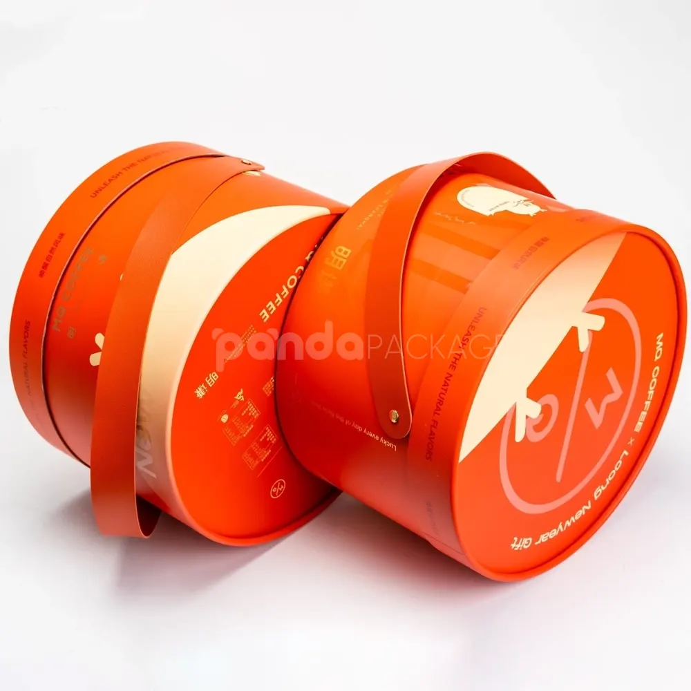 Custom orange round rigid box with lid and handle strap for luxury packaging