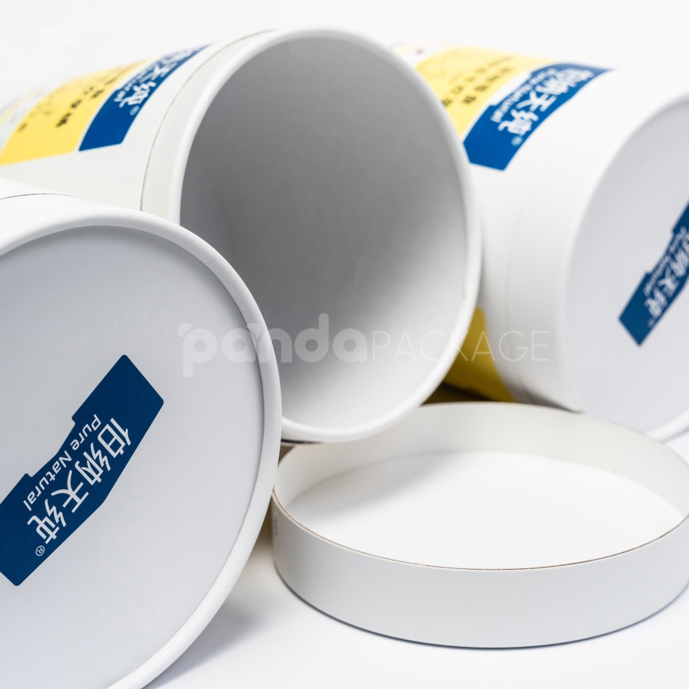 White paperboard round cylinder box with detachable top lid