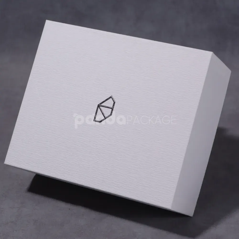 Minimalist white rigid box with magnetic flip lid for premium packaging