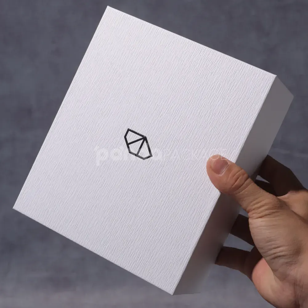Minimalist white rigid box with magnetic flip lid for premium packaging
