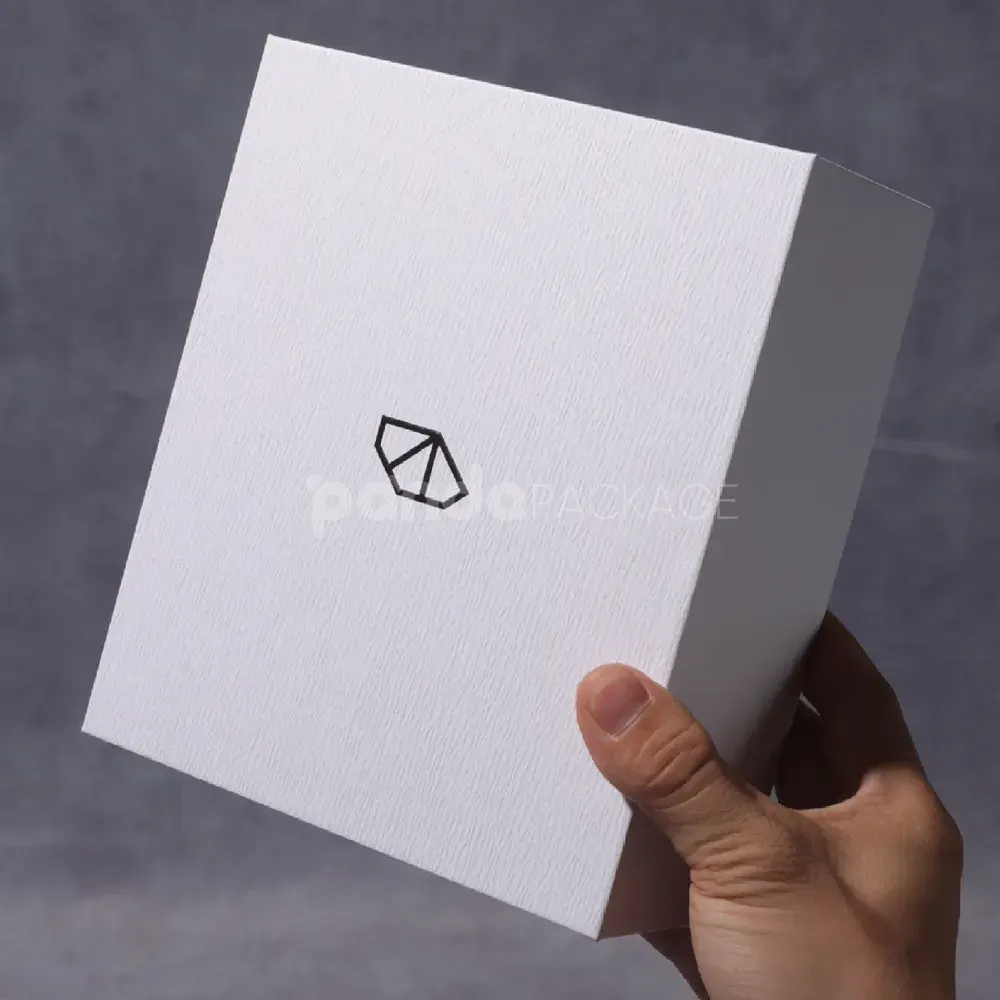 Minimalist white rigid box with magnetic flip lid for premium packaging