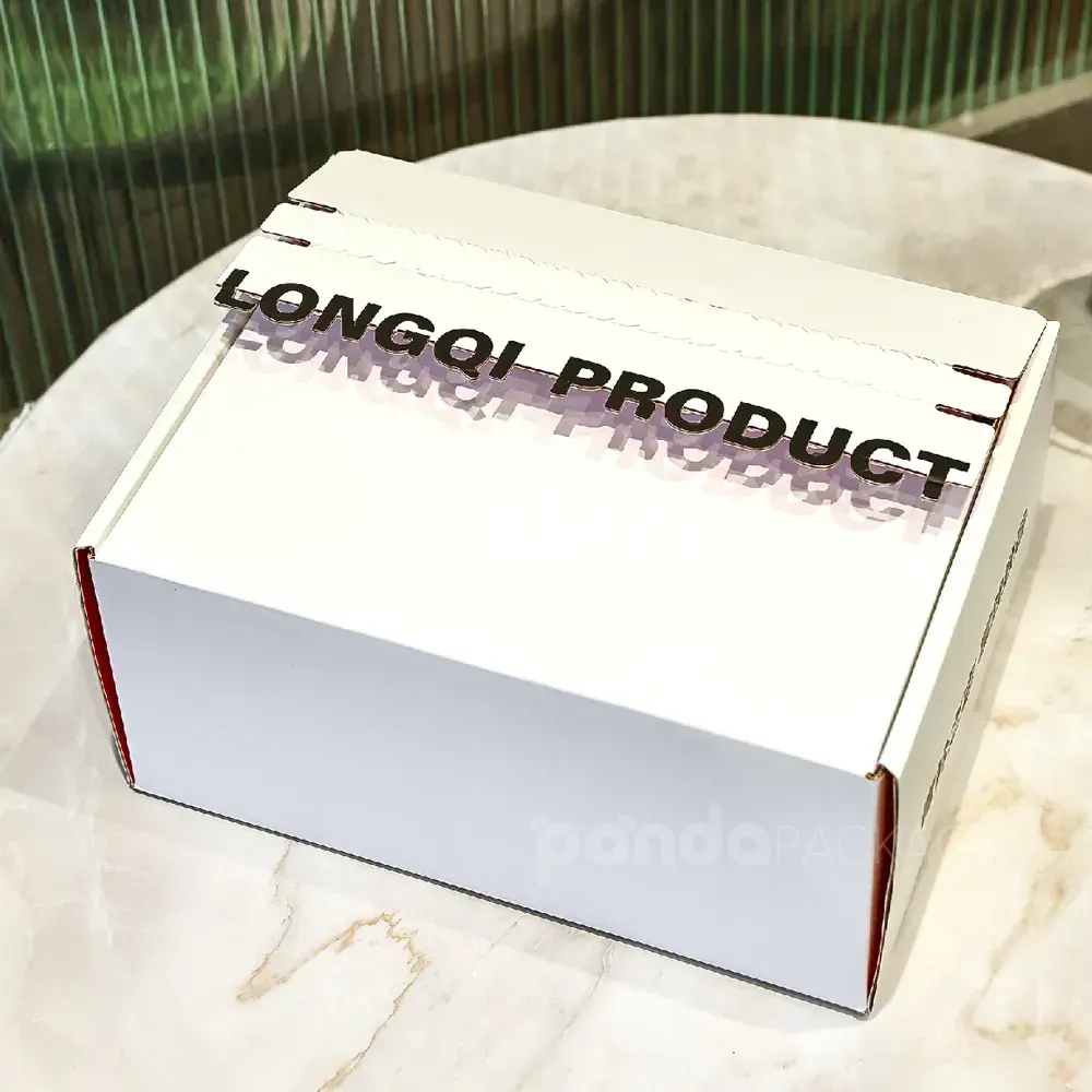 White corrugated mailer box with tear strip and flip lid