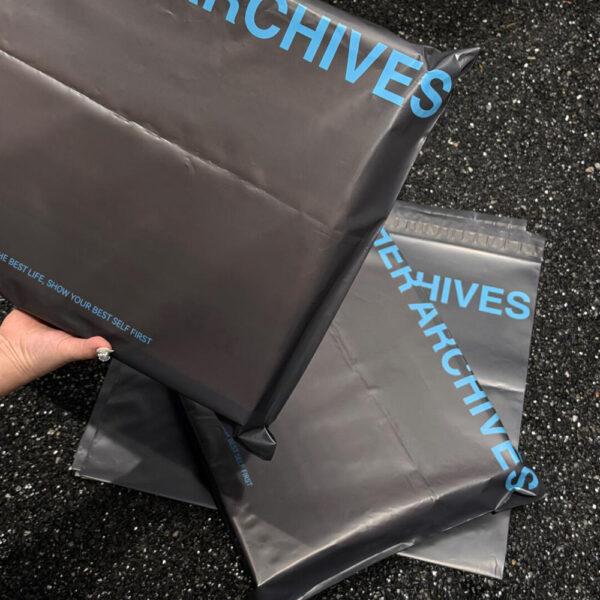 Trendy Black Apparel Mailing Bag with Blue Lettering