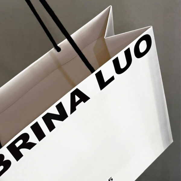 Minimalist White Apparel Shopping Bag with Black Logo Print
