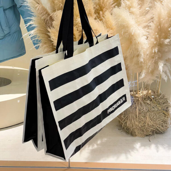Striped Black and White Apparel Shopping Bag with Handles