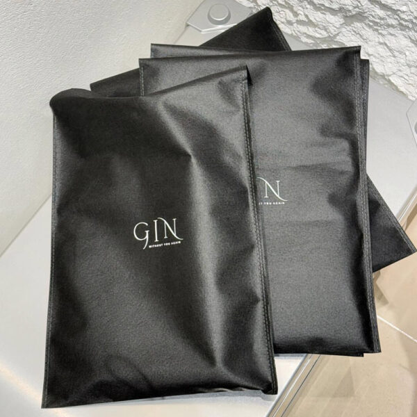 Black Nonwoven Apparel Bag with Durable Reusable Design