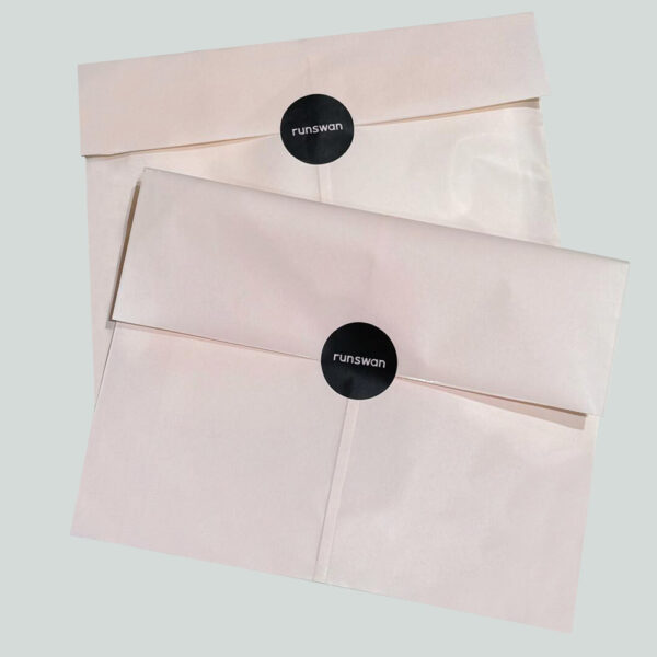 Soft Pink Tissue Apparel Bag with Elegant Feminine Design