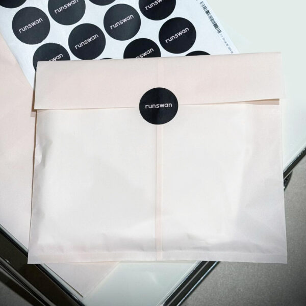 Soft Pink Tissue Apparel Bag with Elegant Feminine Design