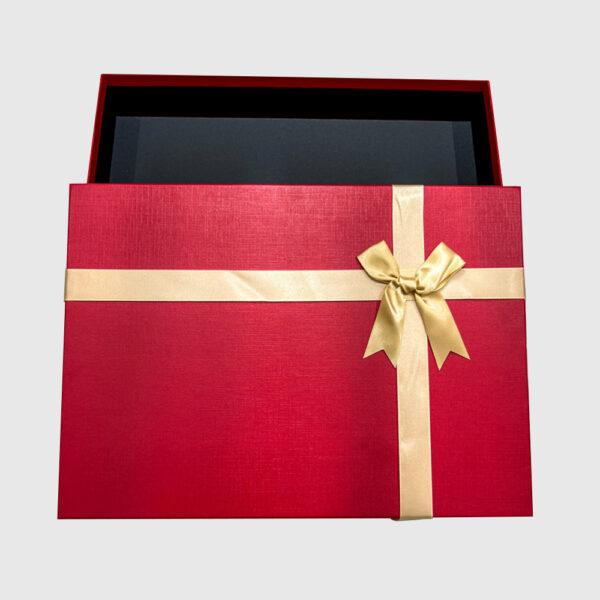 Red Apparel Gift Box with Elegant Golden Ribbon Design
