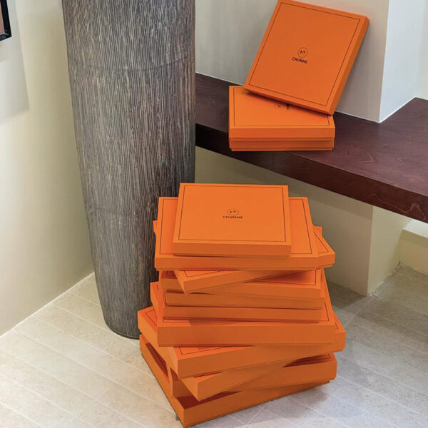 Luxury Orange Apparel Gift Box with Elegant Minimalist Design
