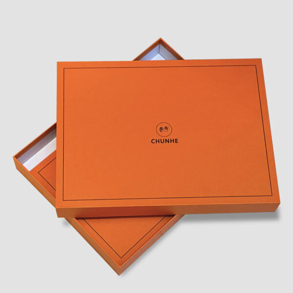 Luxury Orange Apparel Gift Box with Elegant Minimalist Design