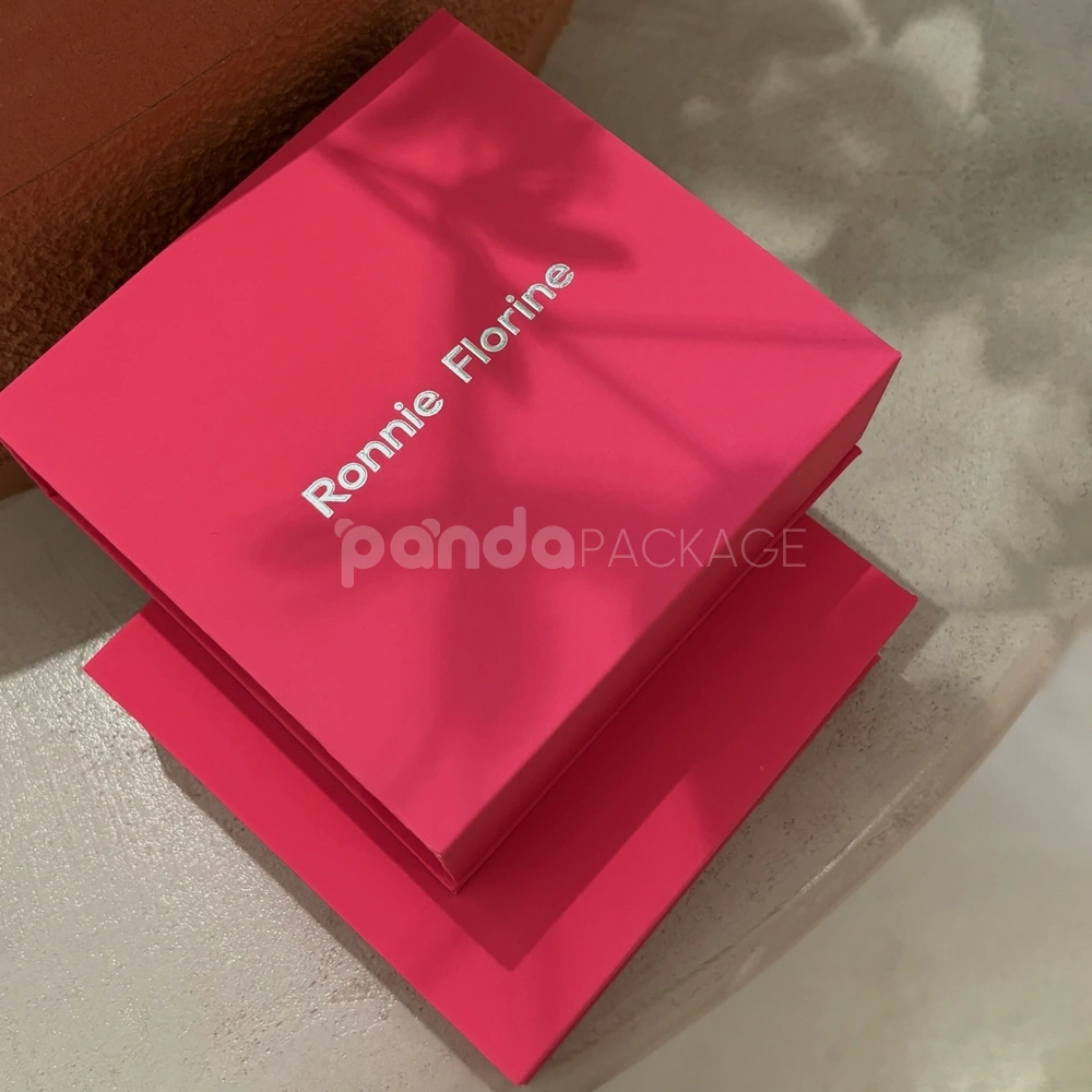 Luxury pink magnetic closure rigid box with silver foil logo