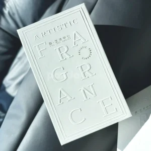 Ivory lift-off lid rigid box with paperboard insert and embossed