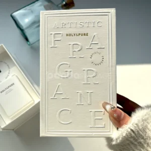Ivory lift-off lid rigid box with paperboard insert and embossed