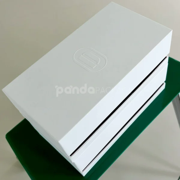 White Embossed Lift-off Rigid Box with Red Accent