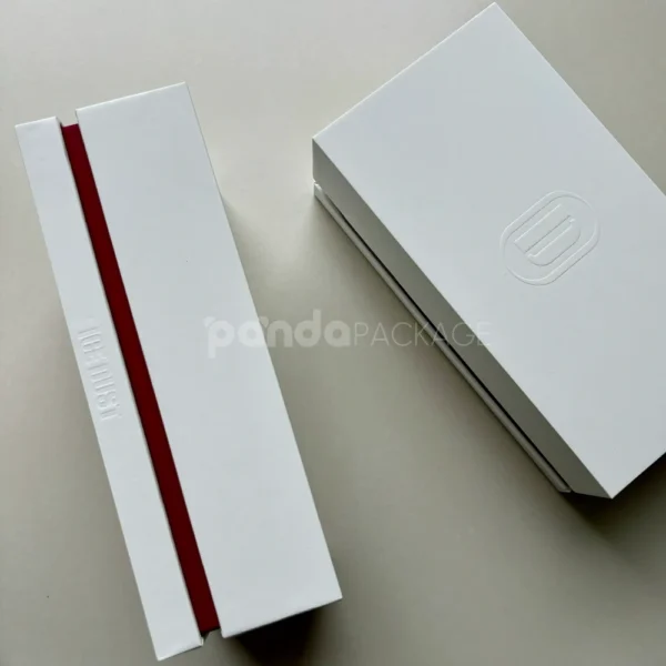 White Embossed Lift-off Rigid Box with Red Accent
