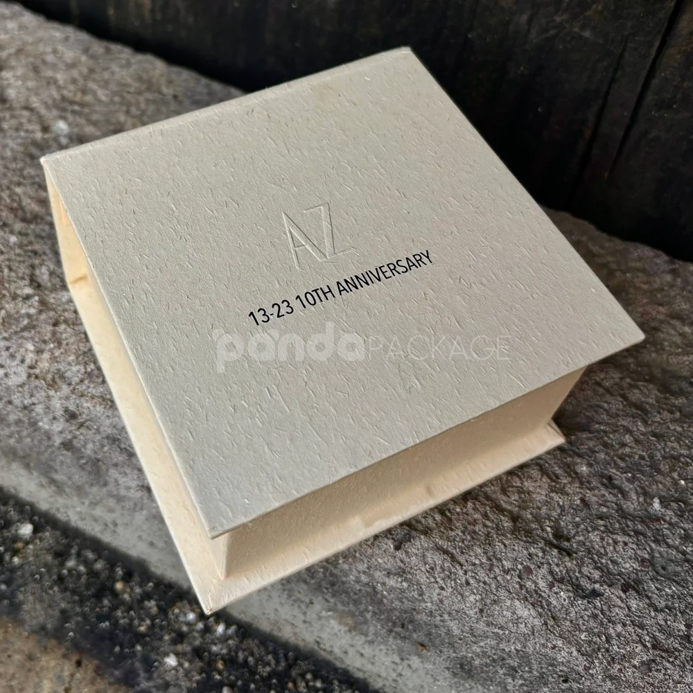 beige textured rigid flip lid box with embossed logo