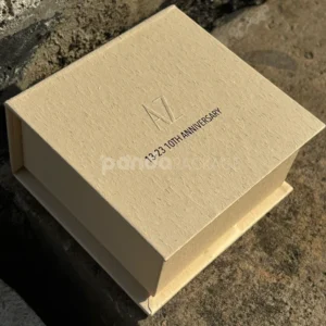 beige textured rigid flip lid box with embossed logo