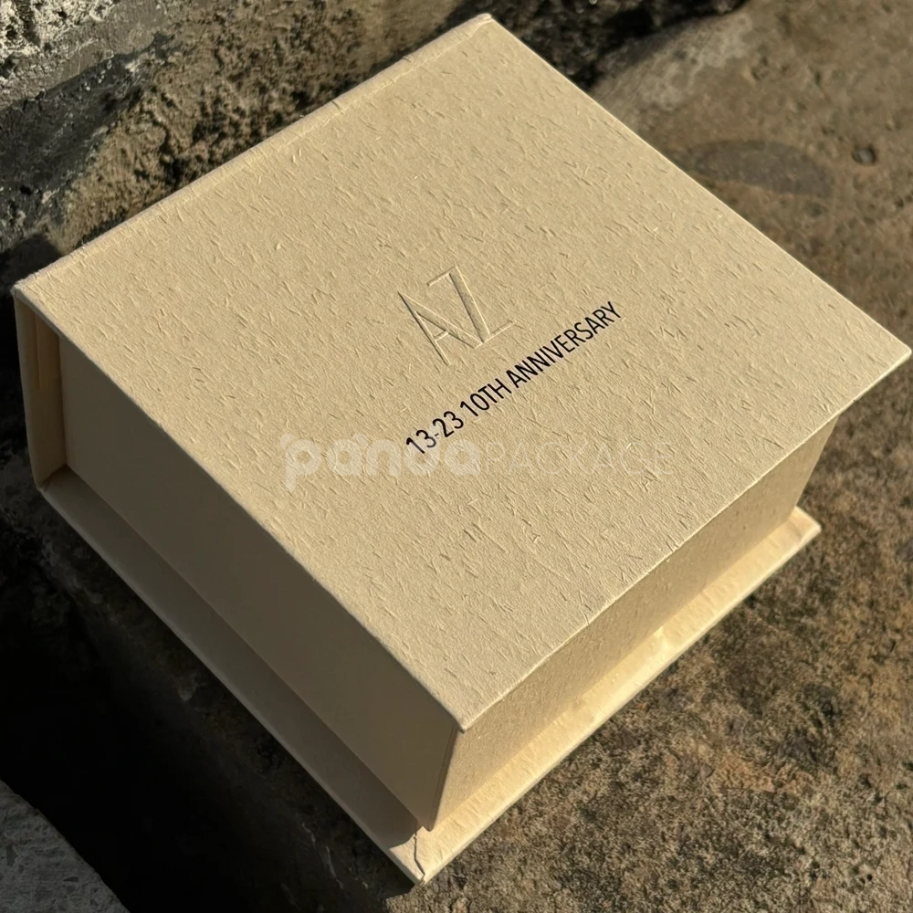 beige textured rigid flip lid box with embossed logo