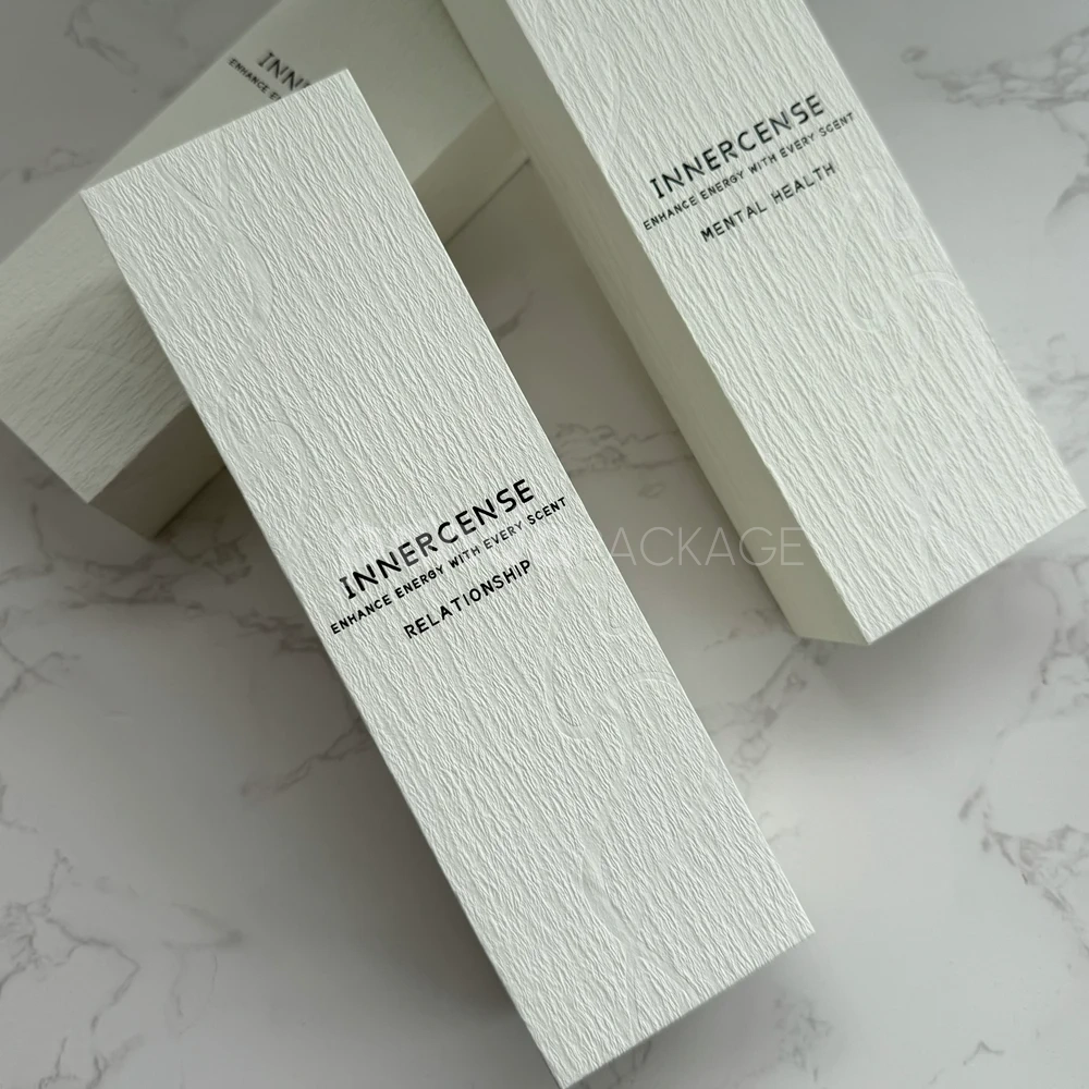 ivory textured rigid drawer box with embossed surface