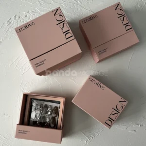 pink rigid drawer box with modern printed typography design