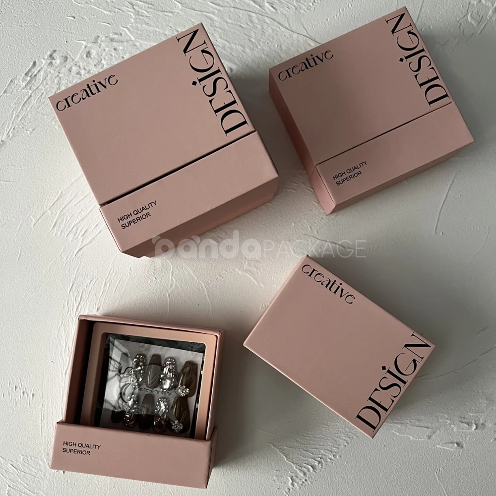 pink rigid drawer box with modern printed typography design
