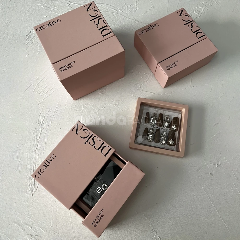 pink rigid drawer box with modern printed typography design