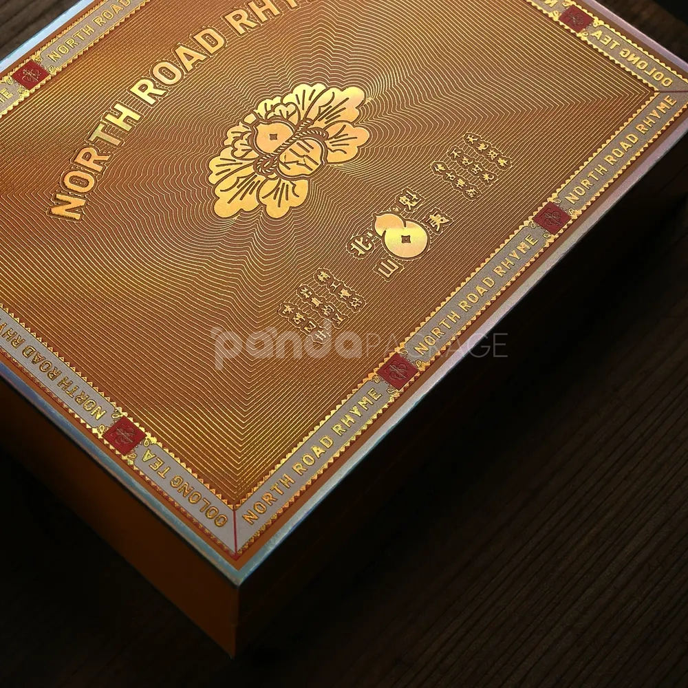 gold foil stamped luxury rigid packaging box with embossed design