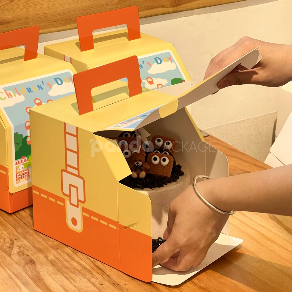 Eco-friendly paperboard cake carry box with ferris wheel design and handle