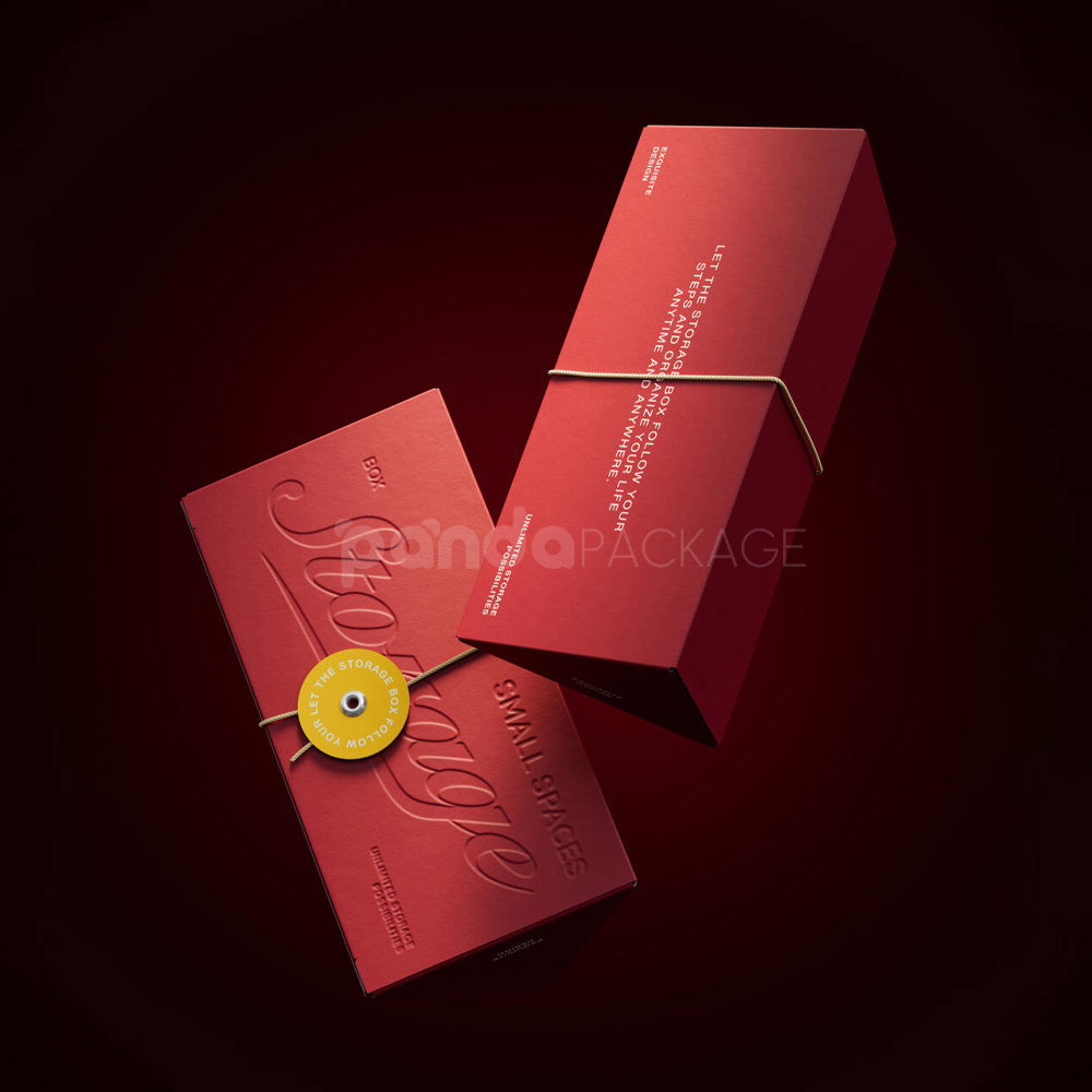 red triangle paperboard box with embossed logo and string tie closure
