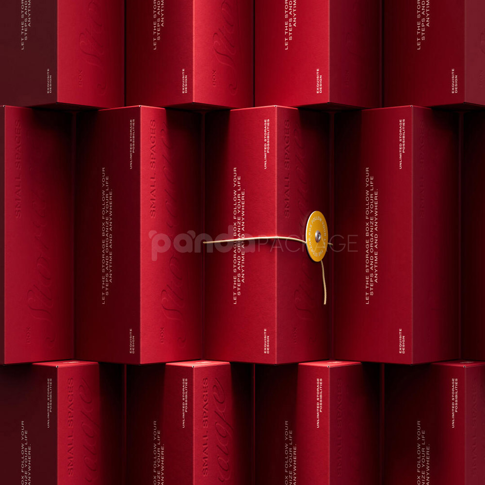 red triangle paperboard box with embossed logo and string tie closure