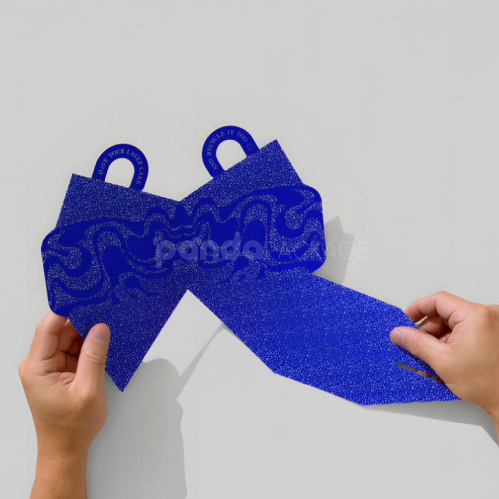 triangle paperboard box with colorful design and handle