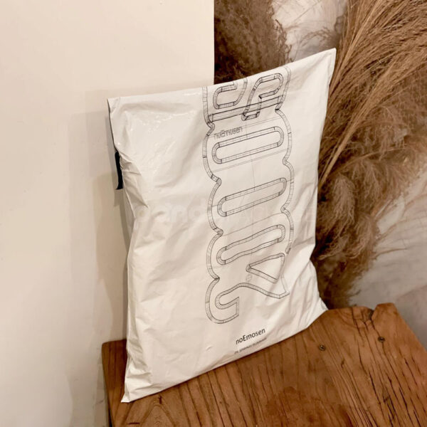 Minimalist White Poly Mailer Bags with Bold Vertical Logo